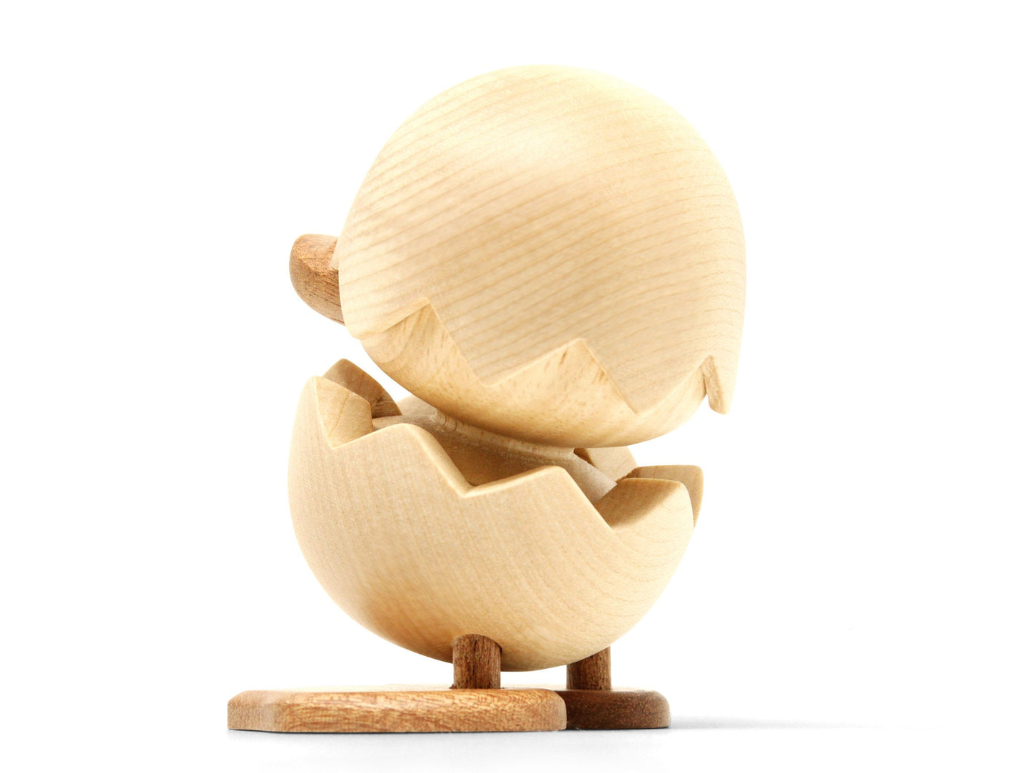 
                  
                    Den grimme ælling figur bagfra.
                  
                